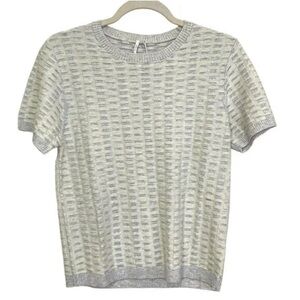 This is a Revolve Hello Nite cashmere blend short sleeve textured sweater